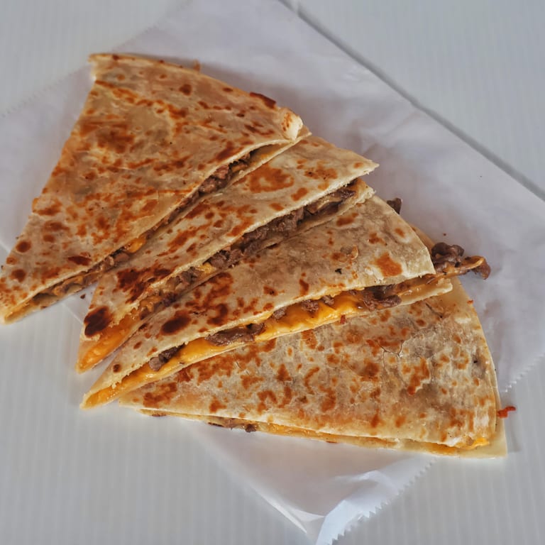 Indulge in Our Quesadilla